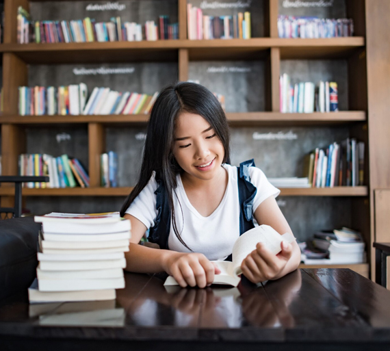 young woman reading book young woman reading book
